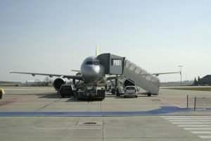 landed aircraft in airport with ladder